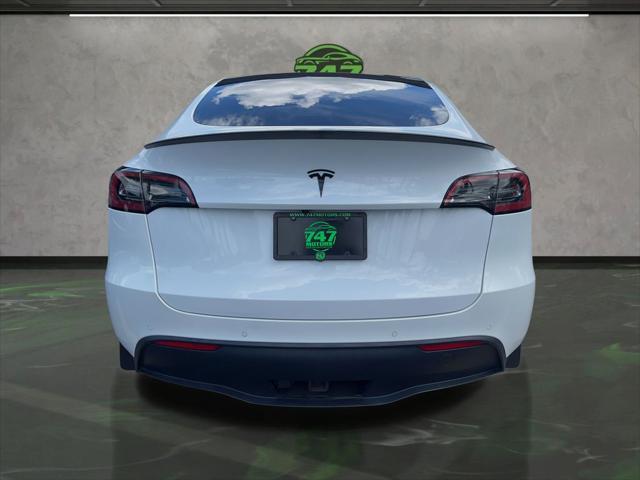Photo of 2022 Pearl White Multi-Coat Tesla Model Y