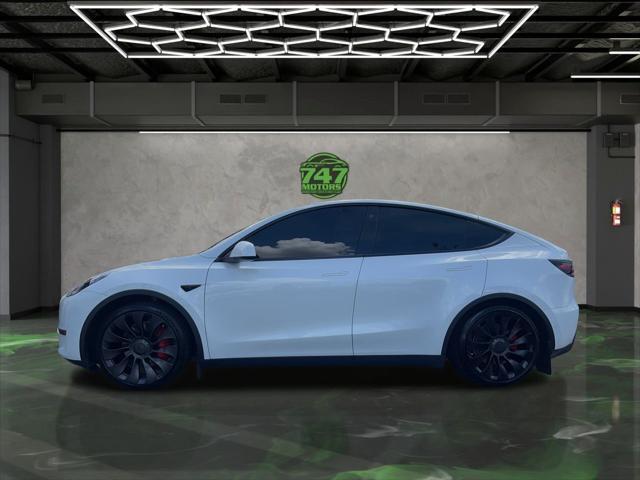 Photo of 2022 Pearl White Multi-Coat Tesla Model Y