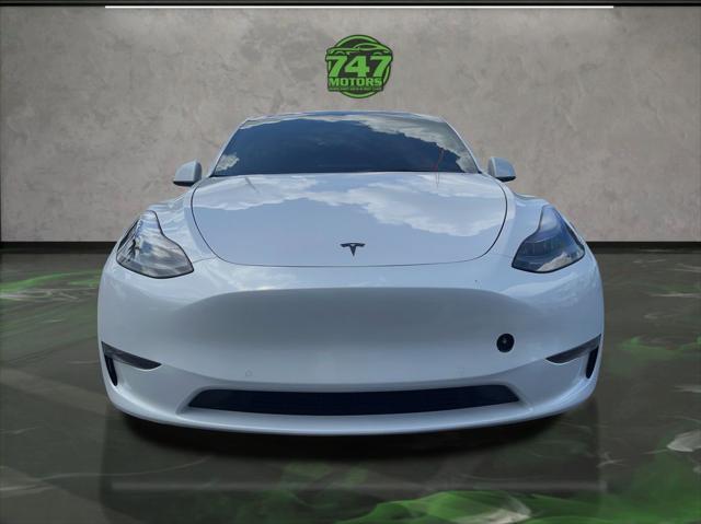 Photo of 2022 Pearl White Multi-Coat Tesla Model Y