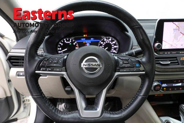 Photo of 2021 Pearl White Tricoat Nissan Altima