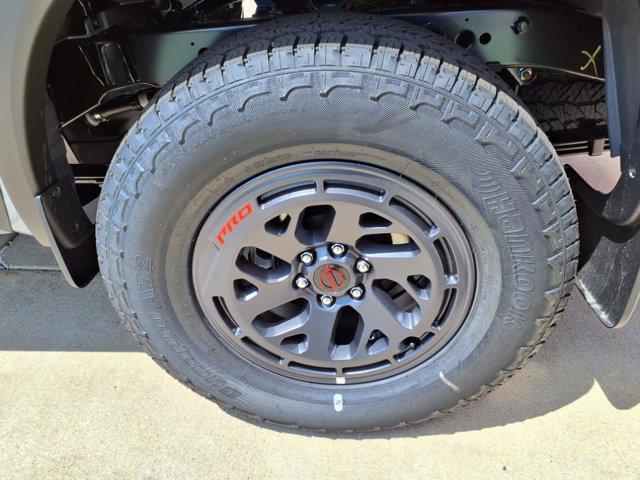 Photo of 2025 Boulder Gray Pearl Nissan Frontier