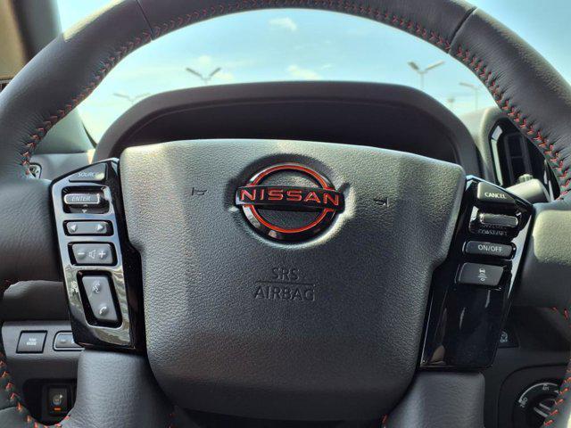 Photo of 2025 Boulder Gray Pearl Nissan Frontier