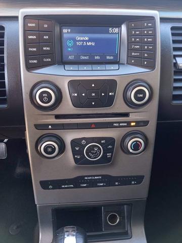 Photo of 2016 black Ford Flex