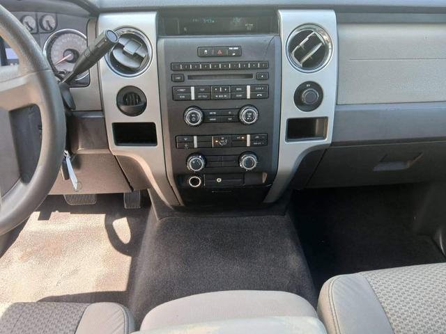 Photo of 2009 black Ford F-150