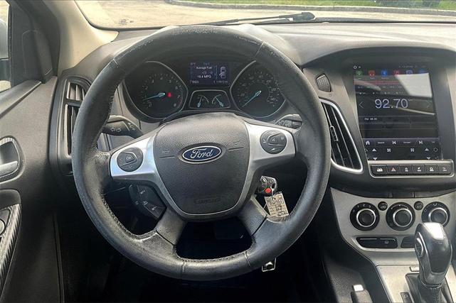 Photo of 2014 Ingot Silver Metallic Ford Focus