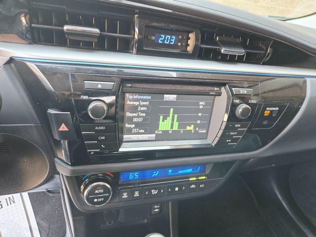 Photo of 2015 Barcelona Red Metallic Toyota Corolla