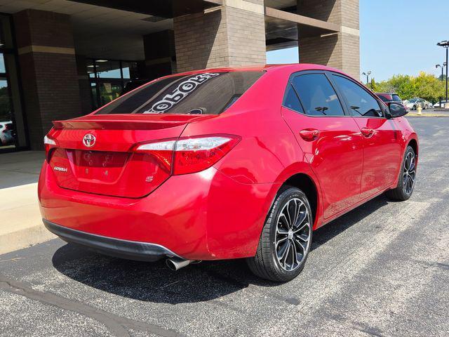 Photo of 2015 Barcelona Red Metallic Toyota Corolla