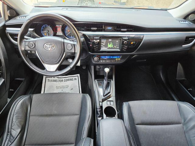 Photo of 2015 Barcelona Red Metallic Toyota Corolla