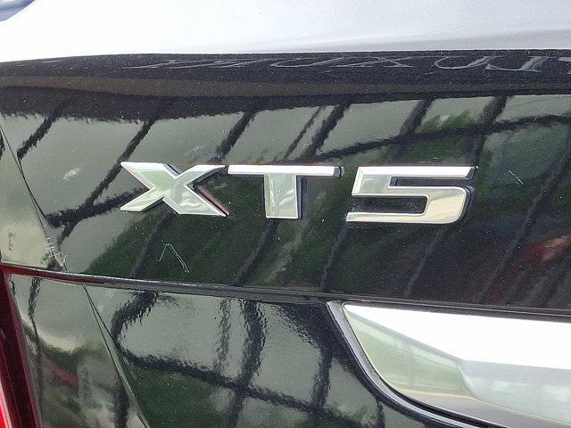 Photo of 2021 Stellar Black Metallic Cadillac XT5