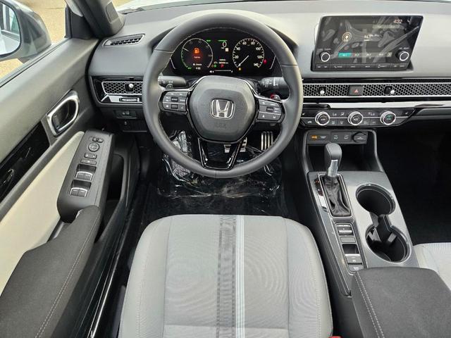 Photo of 2025 Platinum White Pearl Honda Civic Hybrid