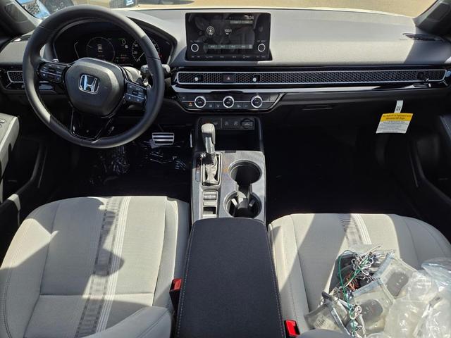 Photo of 2025 Platinum White Pearl Honda Civic Hybrid
