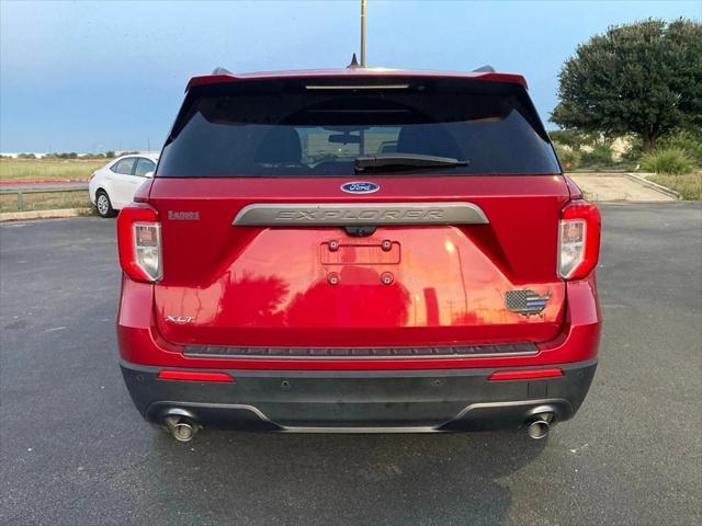 Photo of 2022 Rapid Red Metallic Tinted Clearcoat Ford Explorer