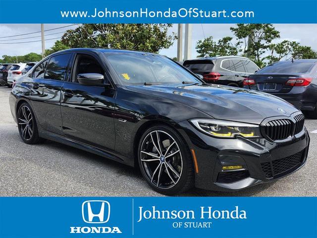 Photo of 2022 Black Sapphire Metallic BMW 330e