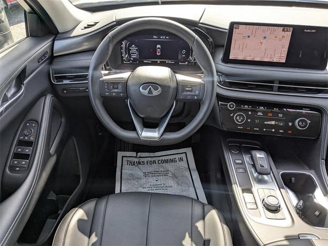 Photo of 2024 Majestic White/Black Obsidian INFINITI QX60