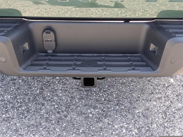 Photo of 2025 Tactical Green Metallic Nissan Frontier