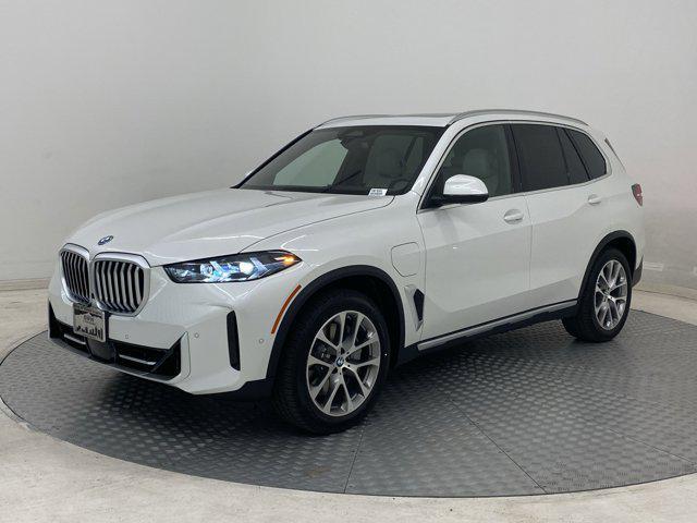 Photo of 2026 Mineral White Metallic BMW X5 PHEV