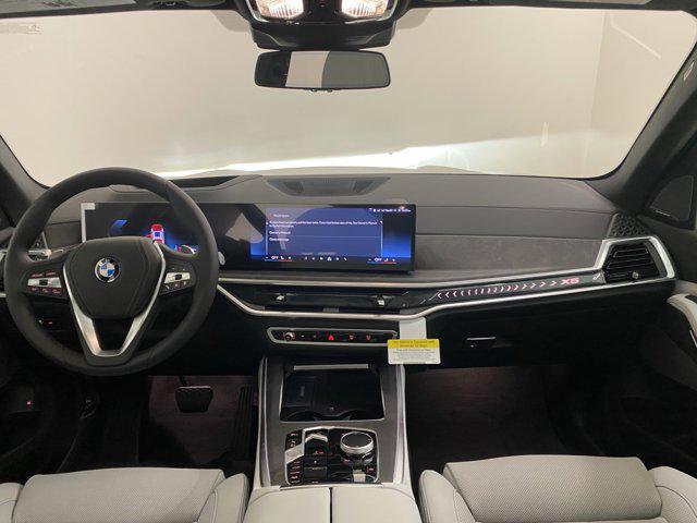 Photo of 2026 Mineral White Metallic BMW X5 PHEV