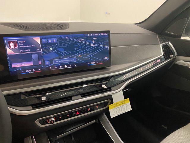 Photo of 2026 Mineral White Metallic BMW X5 PHEV