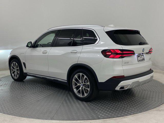 Photo of 2026 Mineral White Metallic BMW X5 PHEV