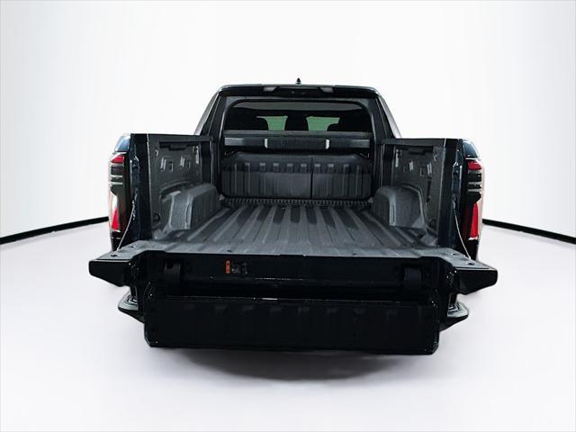 Photo of 2025 Deep Ocean Metallic GMC Sierra EV