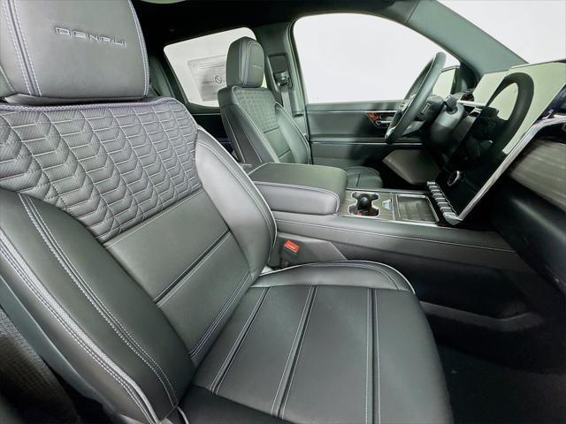 Photo of 2025 Deep Ocean Metallic GMC Sierra EV