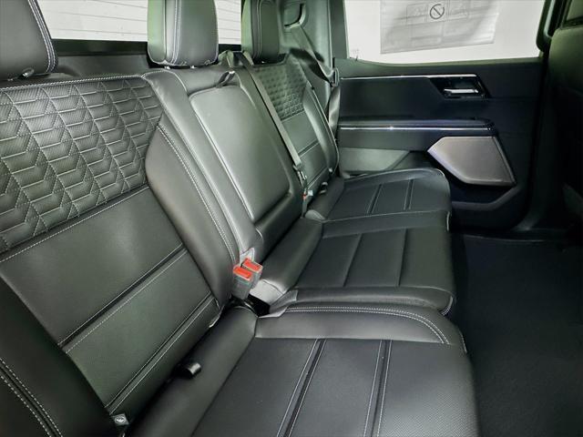 Photo of 2025 Deep Ocean Metallic GMC Sierra EV
