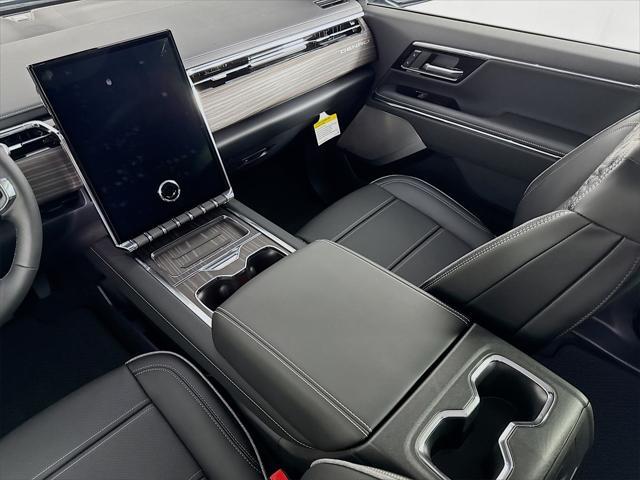 Photo of 2025 Deep Ocean Metallic GMC Sierra EV