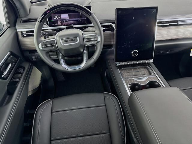 Photo of 2025 Deep Ocean Metallic GMC Sierra EV