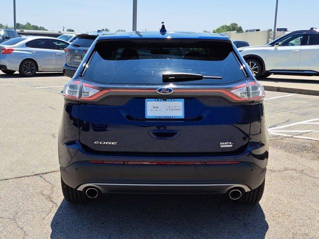 Photo of 2016 Kona Blue Ford Edge