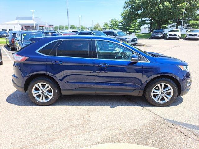 Photo of 2016 Kona Blue Ford Edge