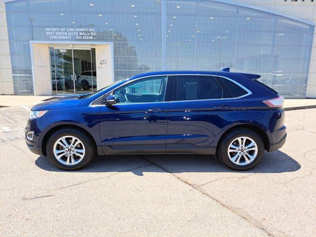 Photo of 2016 Kona Blue Ford Edge
