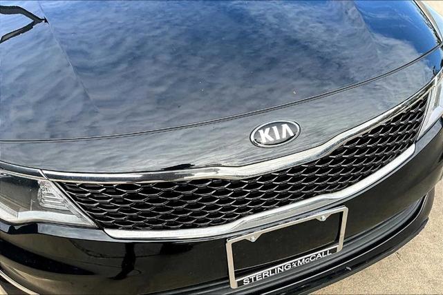 Photo of 2017 Ebony Black Kia Optima