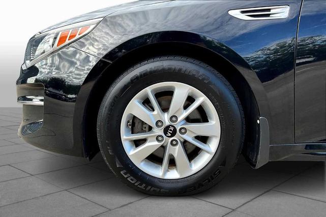 Photo of 2017 Ebony Black Kia Optima
