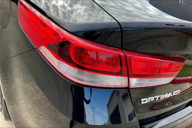 Photo of 2017 Ebony Black Kia Optima