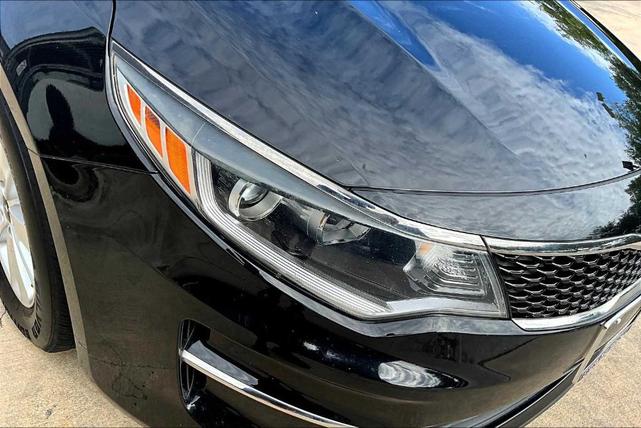 Photo of 2017 Ebony Black Kia Optima