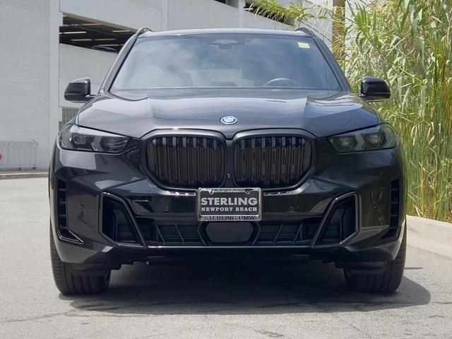 Photo of 2024 Black Sapphire Metallic BMW X5 PHEV