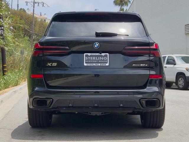 Photo of 2024 Black Sapphire Metallic BMW X5 PHEV