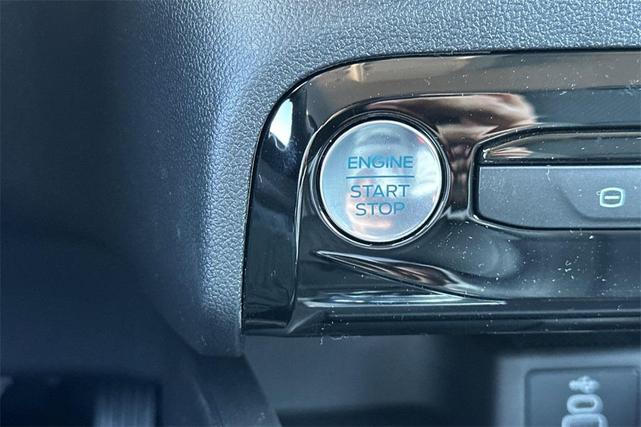 Photo of 2025 Star White Metallic Tri-Coat Ford Escape PHEV