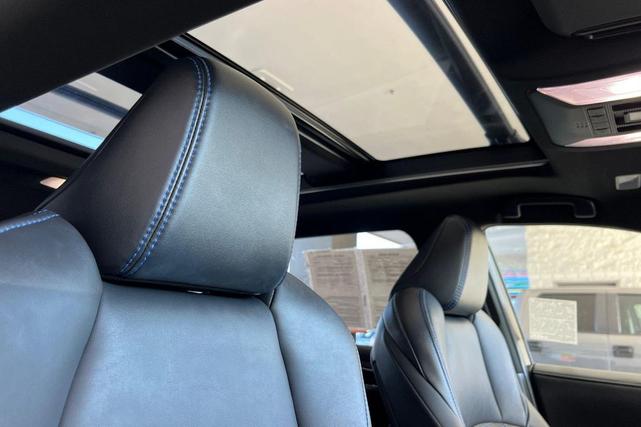 Photo of 2022 Blizzard Pearl/Midnight Black Metallic Toyota RAV4 Hybrid
