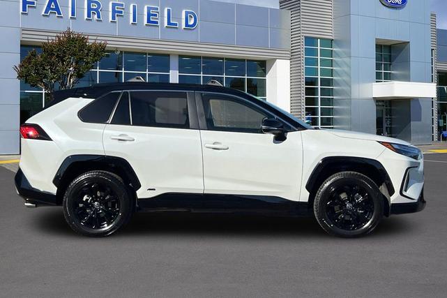Photo of 2022 Blizzard Pearl/Midnight Black Metallic Toyota RAV4 Hybrid