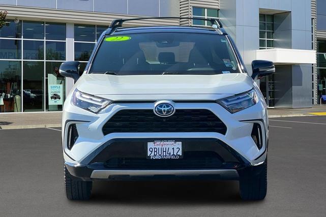 Photo of 2022 Blizzard Pearl/Midnight Black Metallic Toyota RAV4 Hybrid