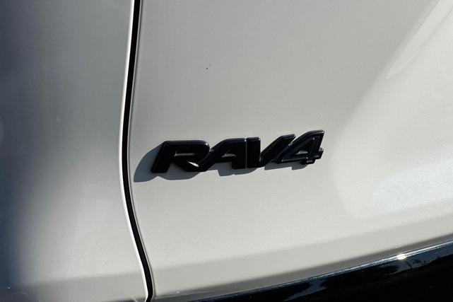 Photo of 2022 Blizzard Pearl/Midnight Black Metallic Toyota RAV4 Hybrid