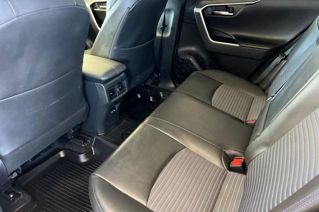 Photo of 2022 Blizzard Pearl/Midnight Black Metallic Toyota RAV4 Hybrid