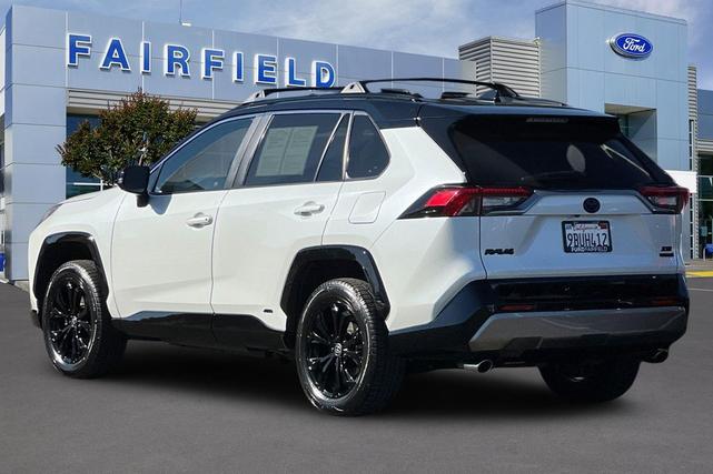 Photo of 2022 Blizzard Pearl/Midnight Black Metallic Toyota RAV4 Hybrid