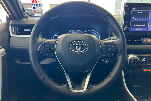 Photo of 2022 Blizzard Pearl/Midnight Black Metallic Toyota RAV4 Hybrid