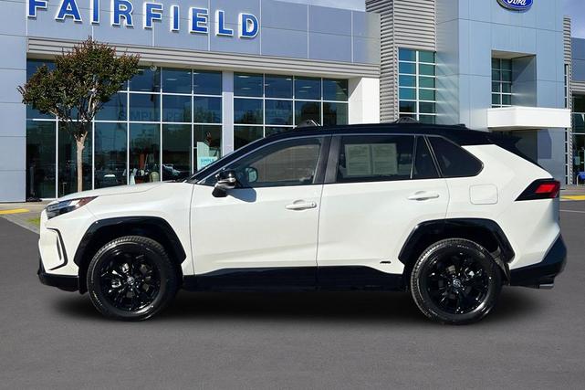Photo of 2022 Blizzard Pearl/Midnight Black Metallic Toyota RAV4 Hybrid