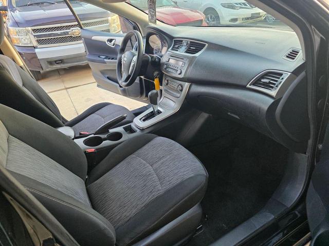 Photo of 2014 Super Black Nissan Sentra
