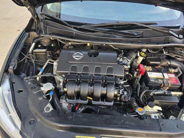 Photo of 2014 Super Black Nissan Sentra