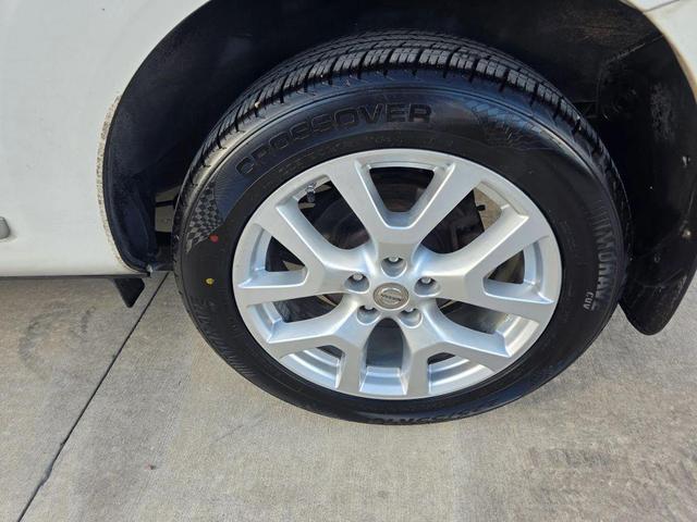Photo of 2011 Pearl White Nissan Rogue