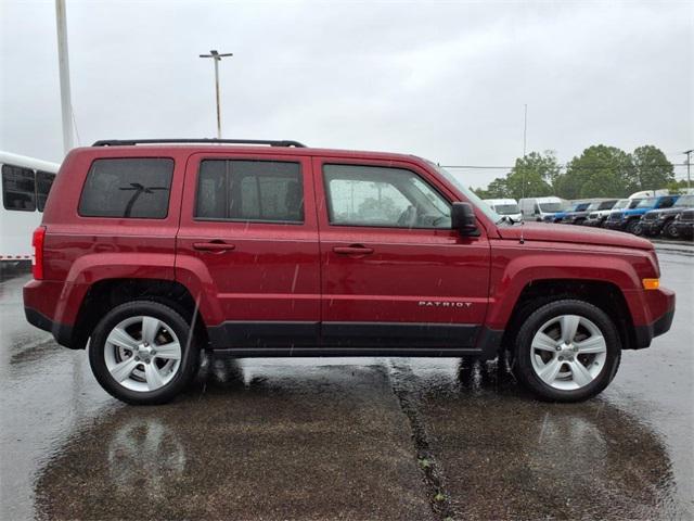 Photo of 2014 Deep Cherry Red Crystal Pearlcoat Jeep Patriot